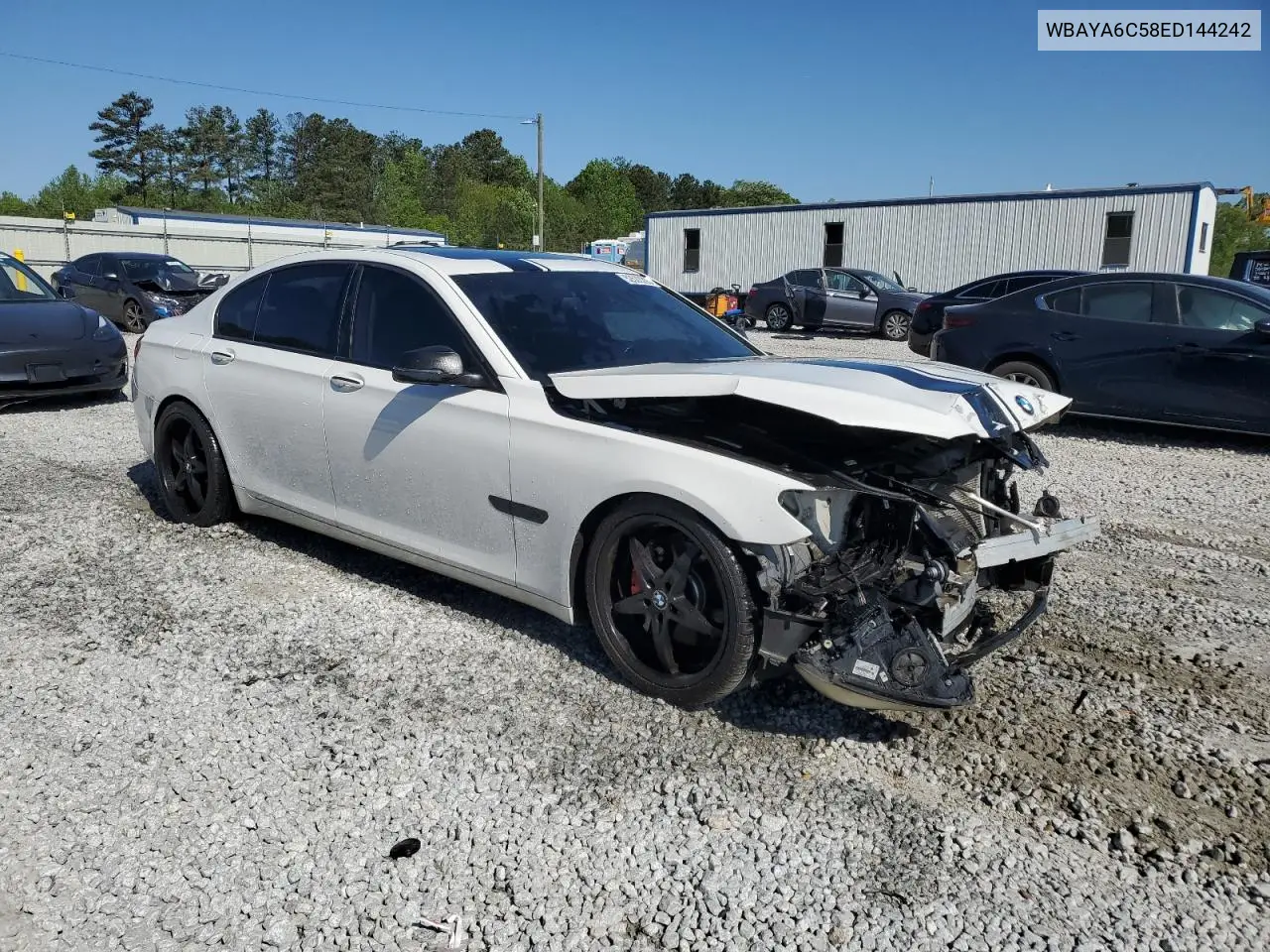 2014 BMW 740 I VIN: WBAYA6C58ED144242 Lot: 52522295