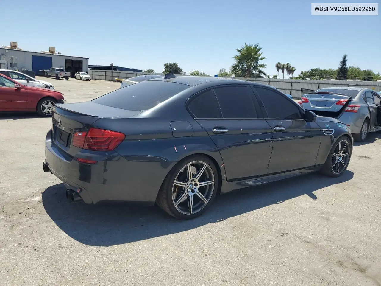 2014 BMW M5 VIN: WBSFV9C58ED592960 Lot: 63113575