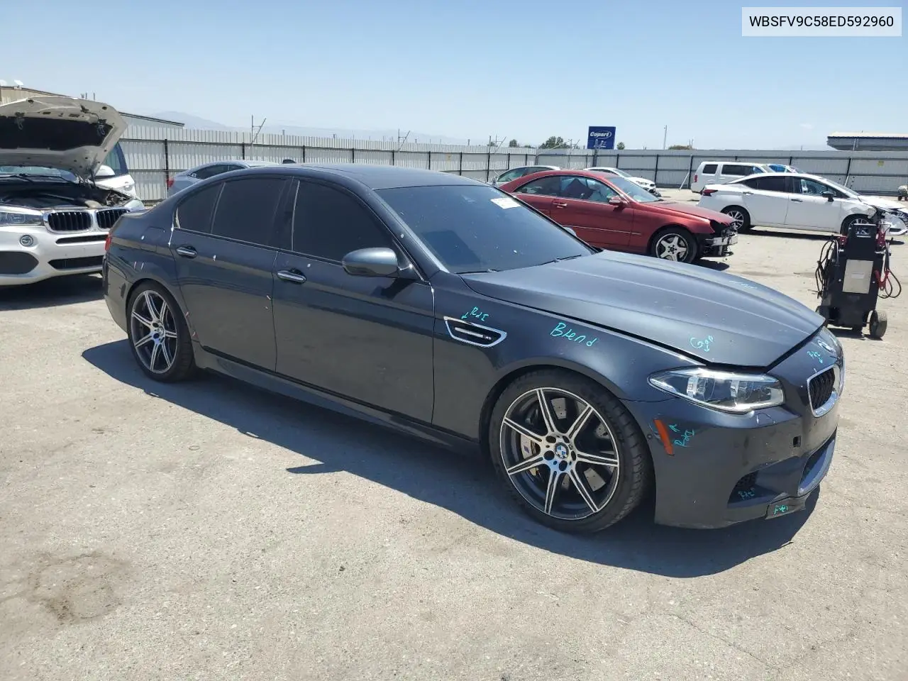 2014 BMW M5 VIN: WBSFV9C58ED592960 Lot: 63113575