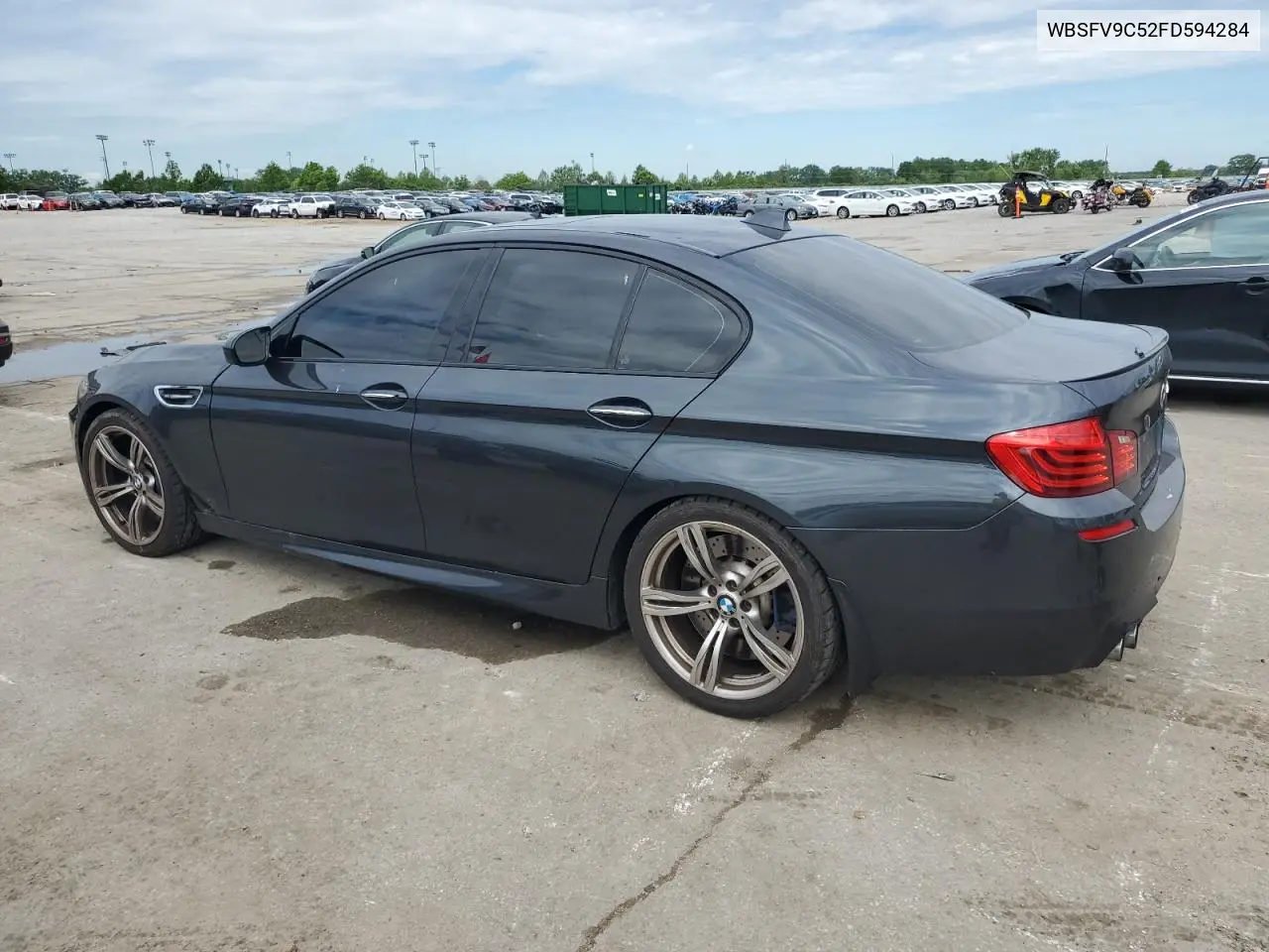 2015 BMW M5 VIN: WBSFV9C52FD594284 Lot: 55893555
