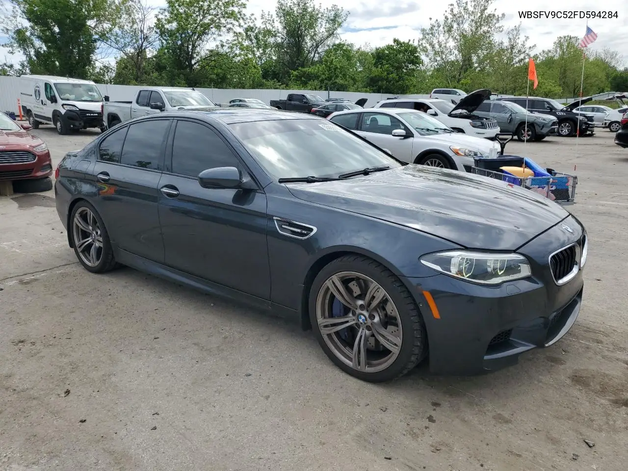 2015 BMW M5 VIN: WBSFV9C52FD594284 Lot: 55893555