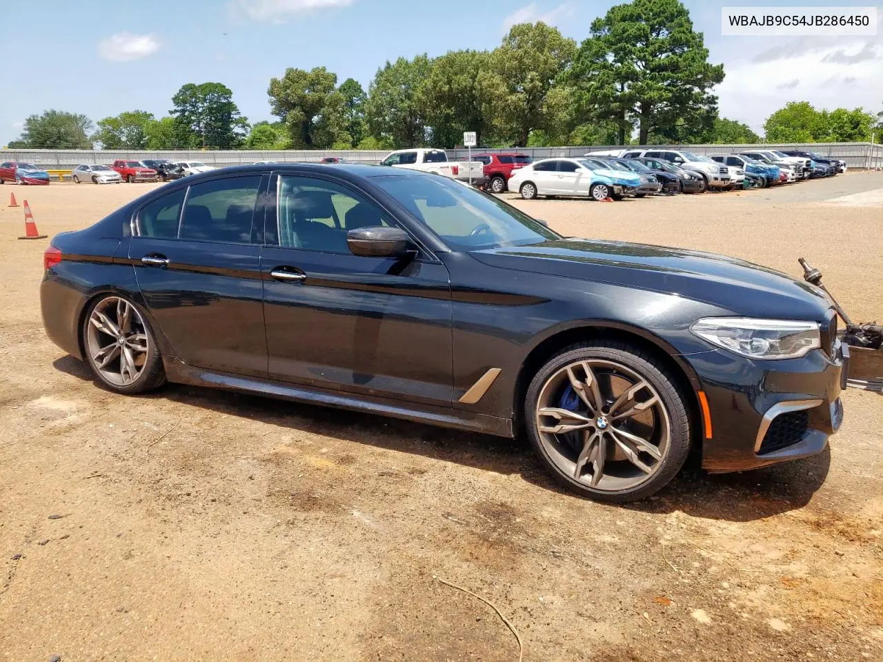 2018 BMW M550Xi VIN: WBAJB9C54JB286450 Lot: 61232125