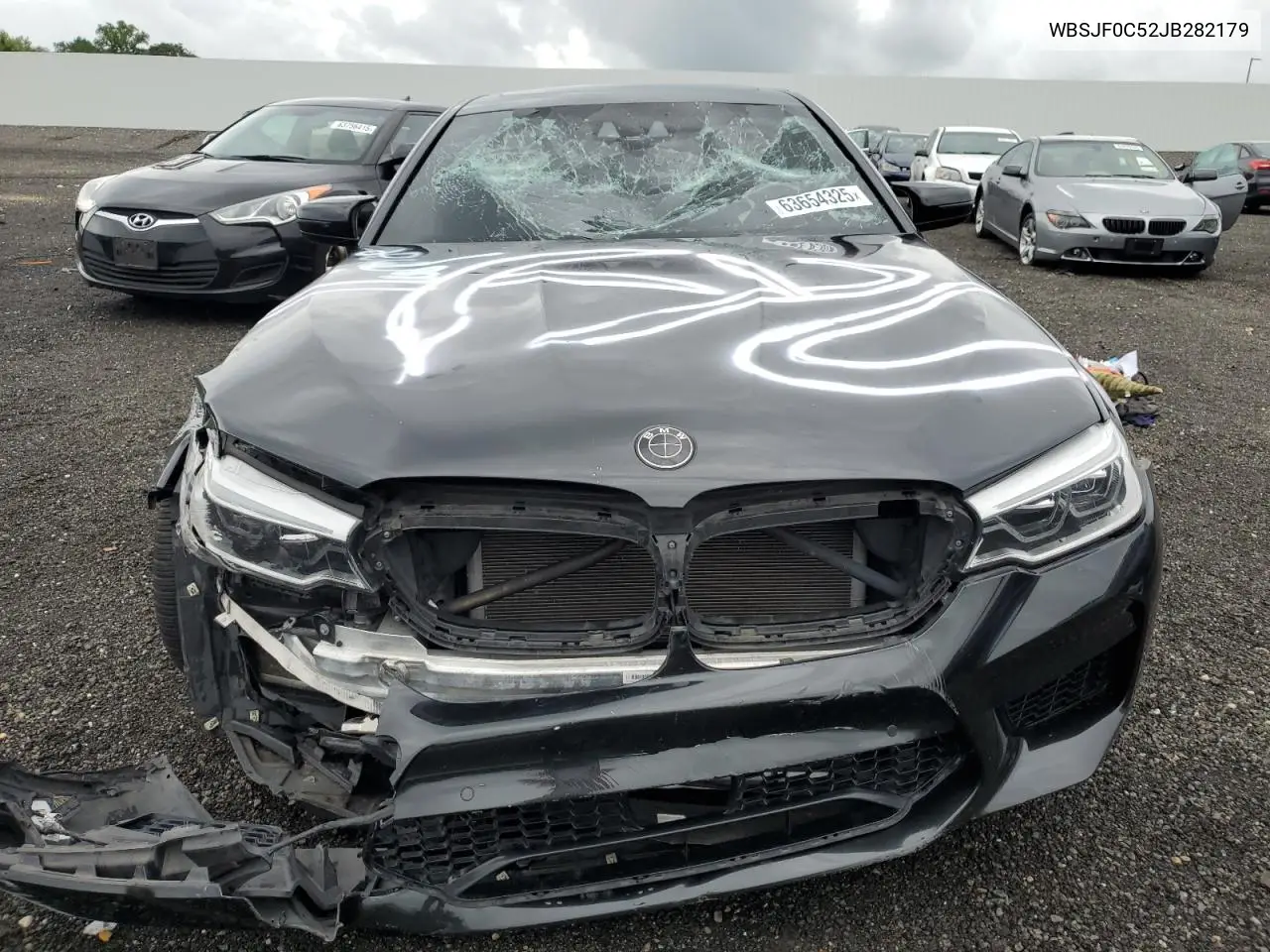 2018 BMW M5 VIN: WBSJF0C52JB282179 Lot: 63654325