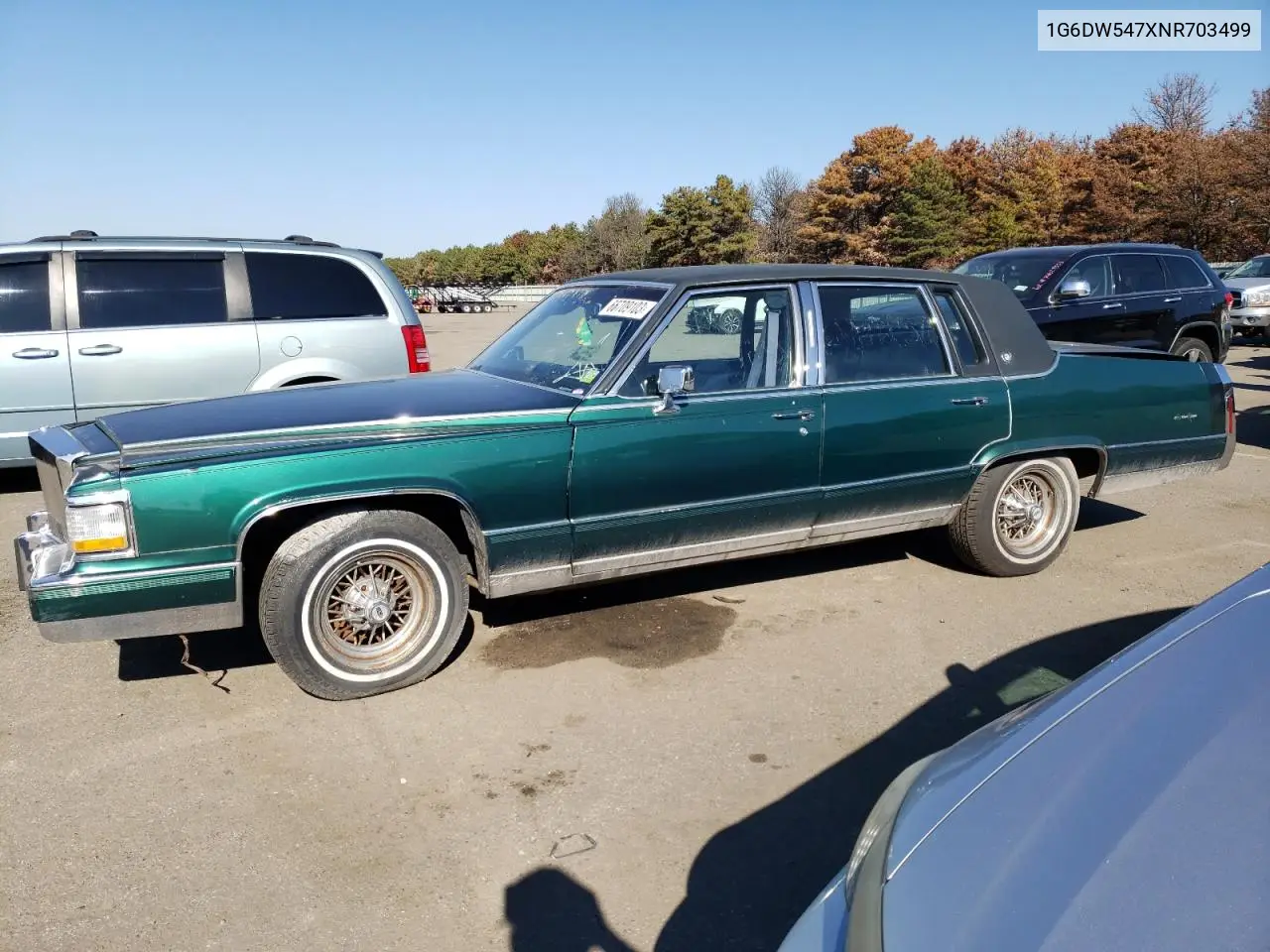 1992 Cadillac Brougham VIN: 1G6DW547XNR703499 Lot: 66709103