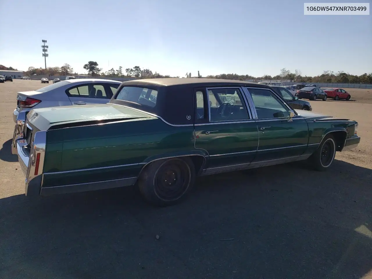 1992 Cadillac Brougham VIN: 1G6DW547XNR703499 Lot: 66709103