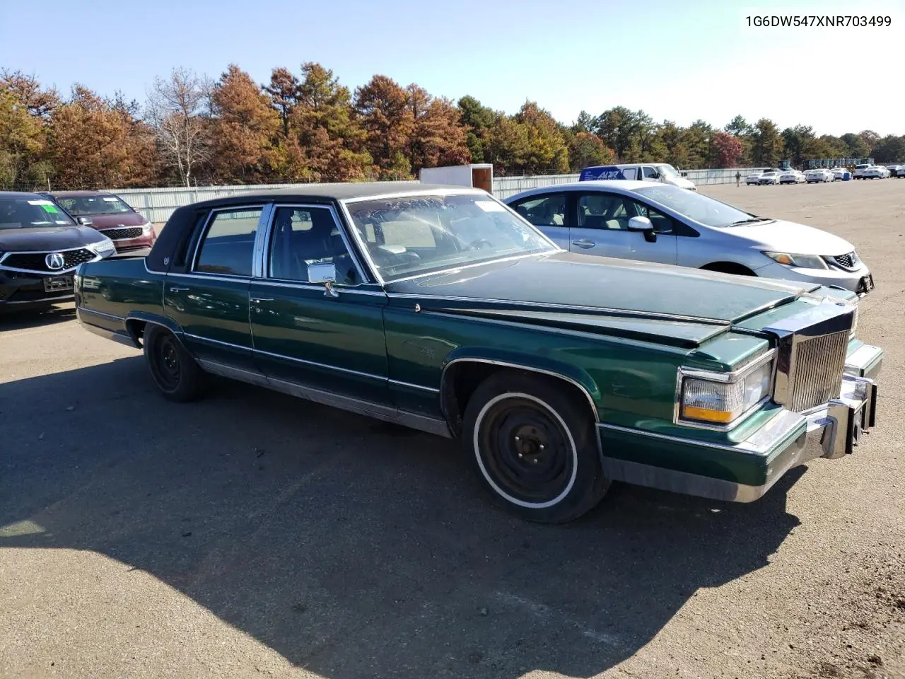 1992 Cadillac Brougham VIN: 1G6DW547XNR703499 Lot: 66709103