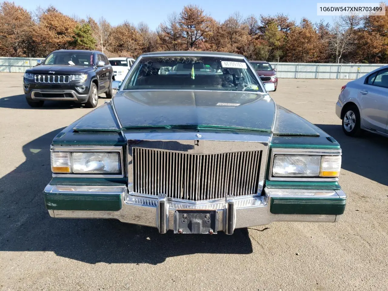 1992 Cadillac Brougham VIN: 1G6DW547XNR703499 Lot: 66709103
