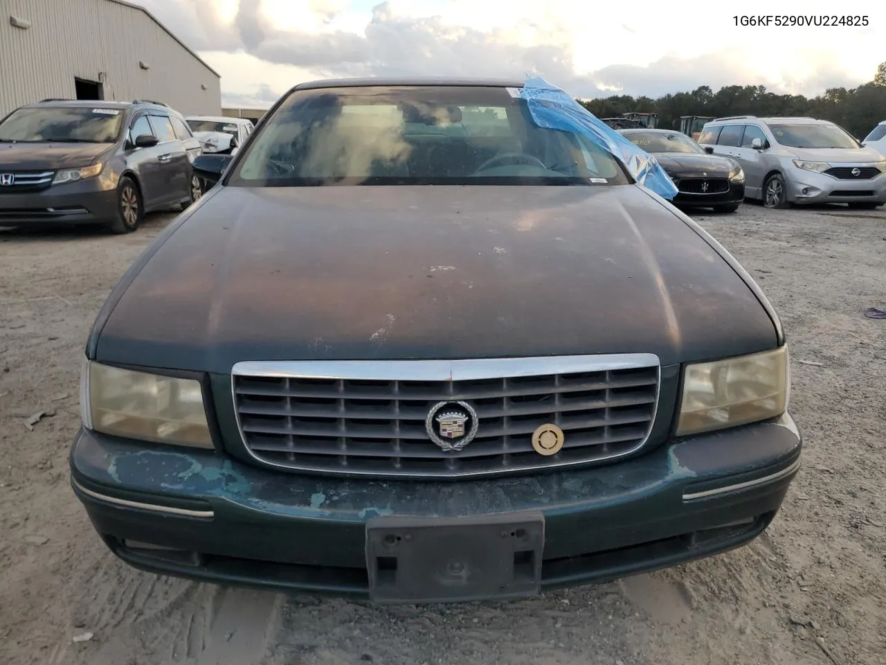 1997 Cadillac Deville Concours VIN: 1G6KF5290VU224825 Lot: 81539524