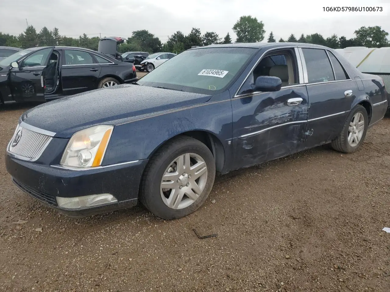 2006 Cadillac Dts VIN: 1G6KD57986U100673 Lot: 61034965