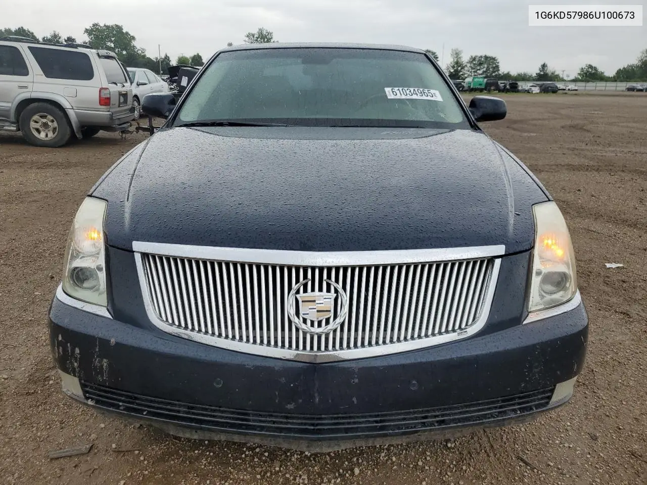 2006 Cadillac Dts VIN: 1G6KD57986U100673 Lot: 61034965