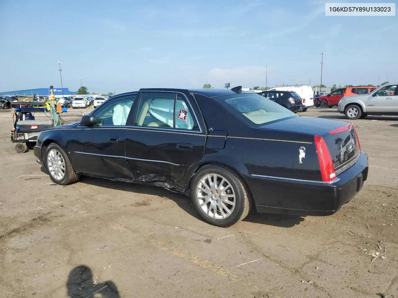 2009 Cadillac Dts VIN: 1G6KD57Y89U133023 Lot: 62395675