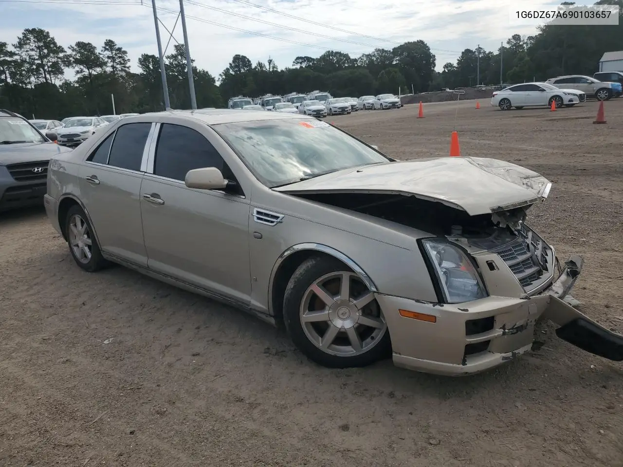 2009 Cadillac Sts VIN: 1G6DZ67A690103657 Lot: 62515015