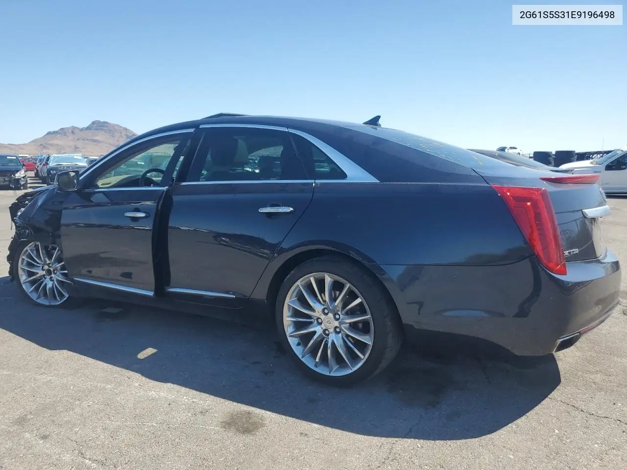 2014 Cadillac Xts Platinum VIN: 2G61S5S31E9196498 Lot: 56231545