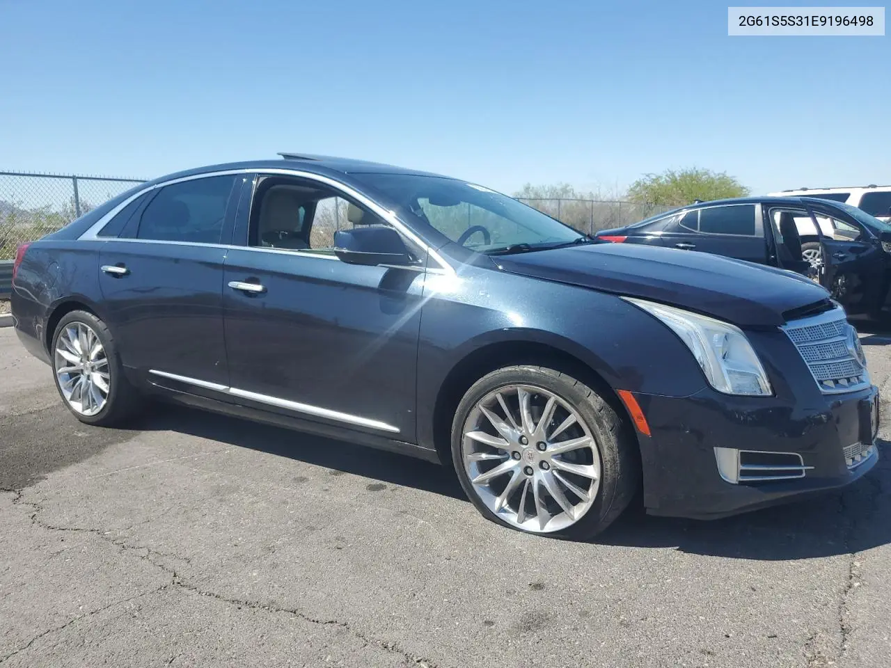 2014 Cadillac Xts Platinum VIN: 2G61S5S31E9196498 Lot: 56231545
