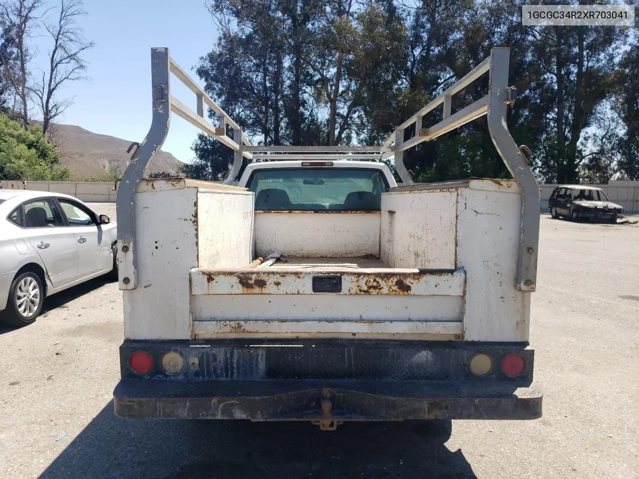 1999 Chevrolet Gmt-400 C3500 VIN: 1GCGC34R2XR703041 Lot: 65077085