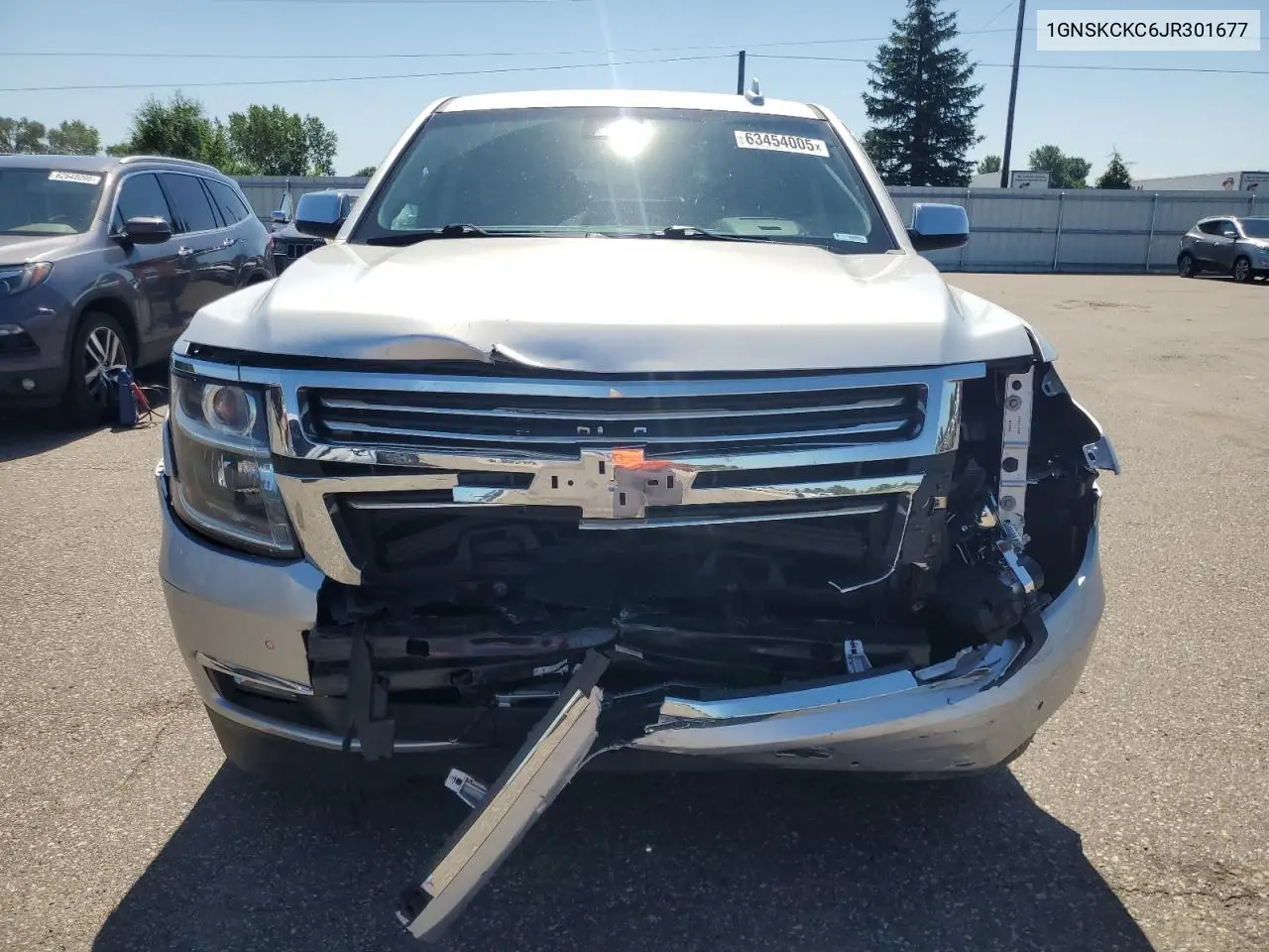 2018 Chevrolet Tahoe K1500 Premier VIN: 1GNSKCKC6JR301677 Lot: 63454005
