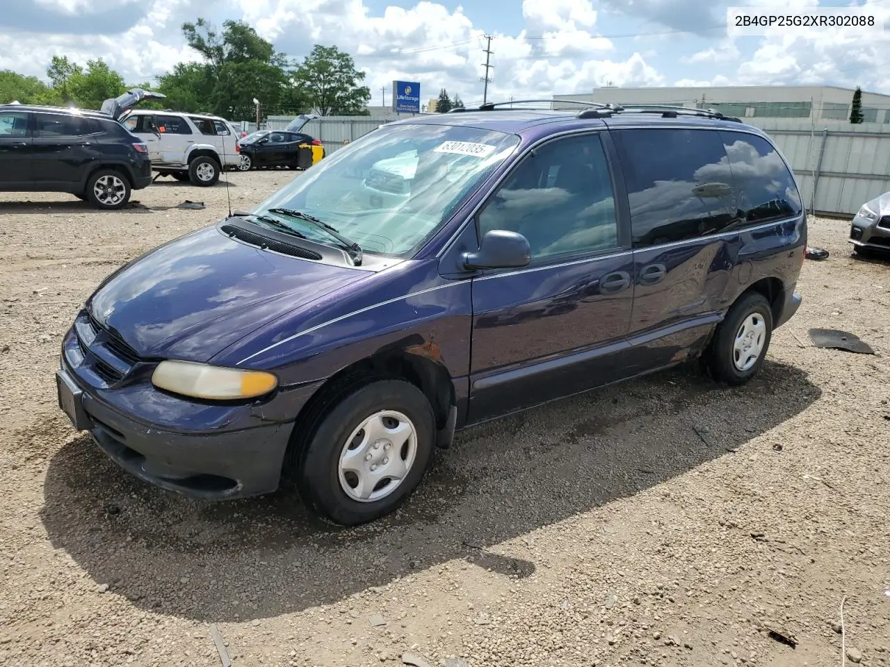 1999 Dodge Caravan VIN: 2B4GP25G2XR302088 Lot: 63012035