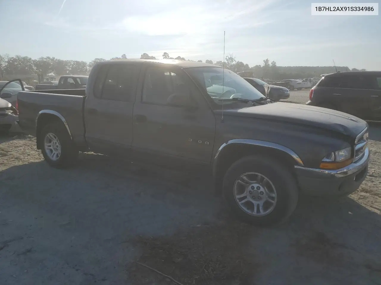 2001 Dodge Dakota Quad VIN: 1B7HL2AX91S334986 Lot: 61963115