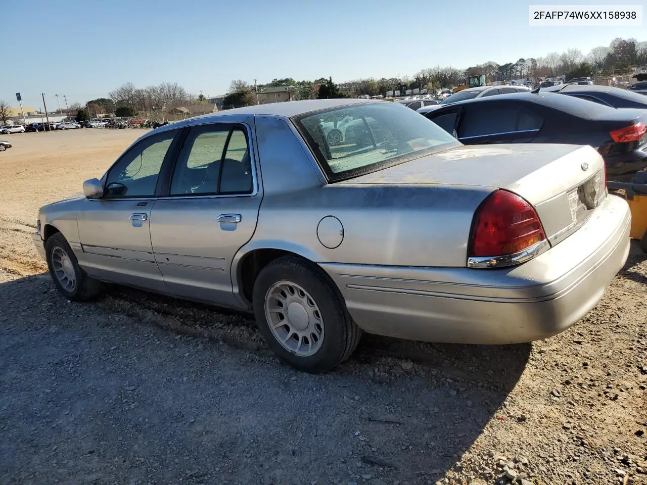1999 Ford Crown Victoria Lx VIN: 2FAFP74W6XX158938 Lot: 49583425