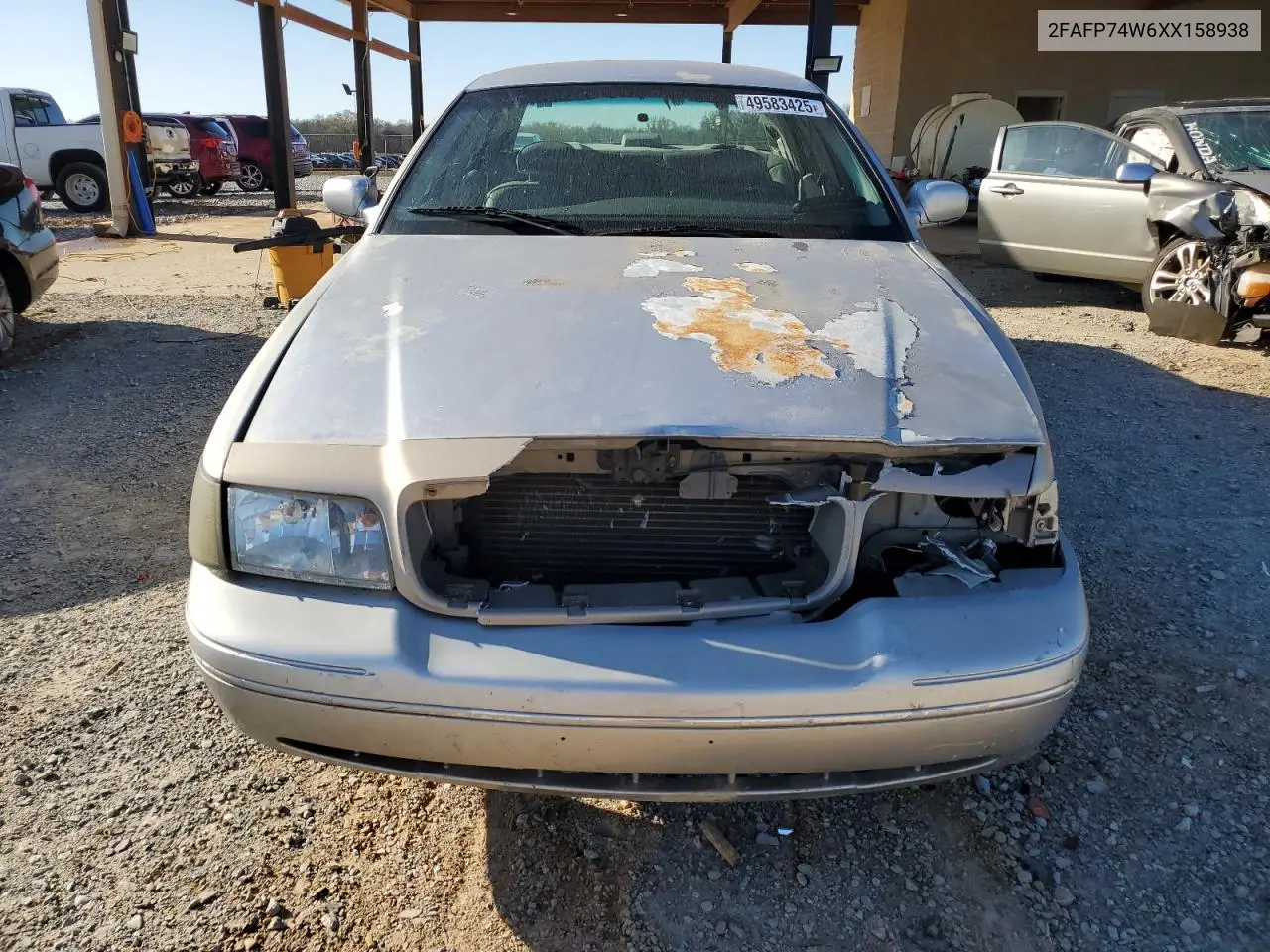 1999 Ford Crown Victoria Lx VIN: 2FAFP74W6XX158938 Lot: 49583425