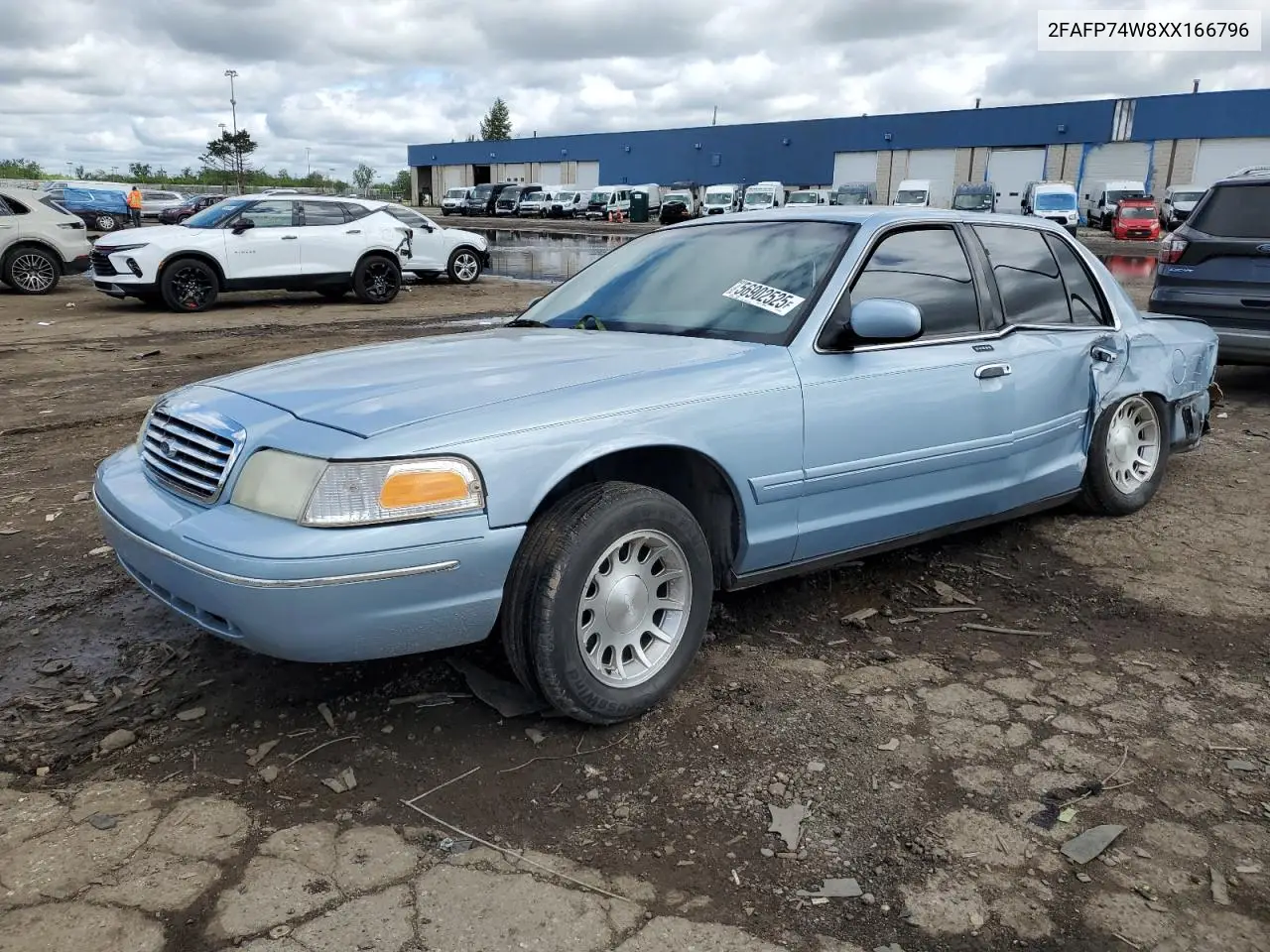 1999 Ford Crown Victoria Lx VIN: 2FAFP74W8XX166796 Lot: 56902525