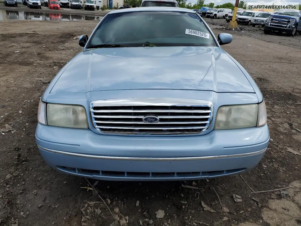 1999 Ford Crown Victoria Lx VIN: 2FAFP74W8XX166796 Lot: 56902525