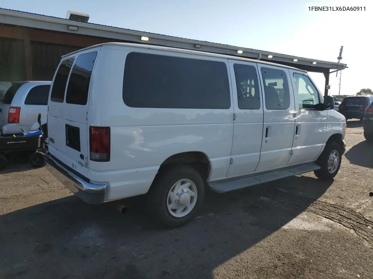 2006 Ford Econoline E350 Super Duty Wagon VIN: 1FBNE31LX6DA60911 Lot: 62935835