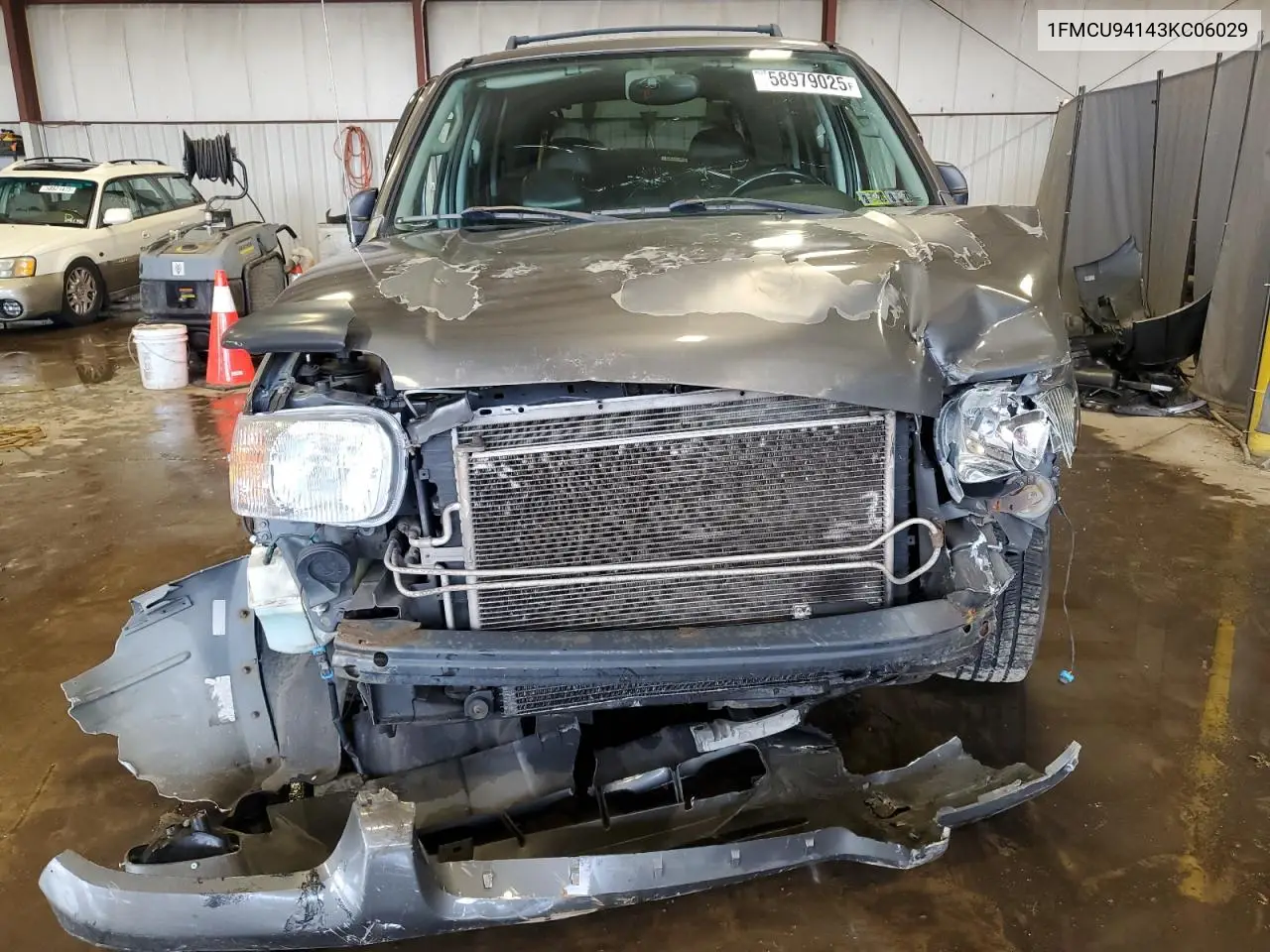 2003 Ford Escape Limited VIN: 1FMCU94143KC06029 Lot: 58979025