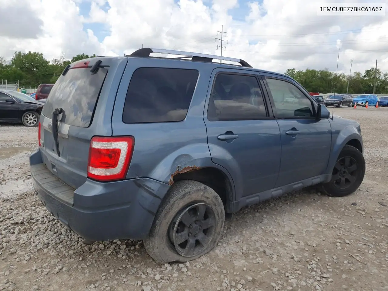 2011 Ford Escape Limited VIN: 1FMCU0E77BKC61667 Lot: 56493325
