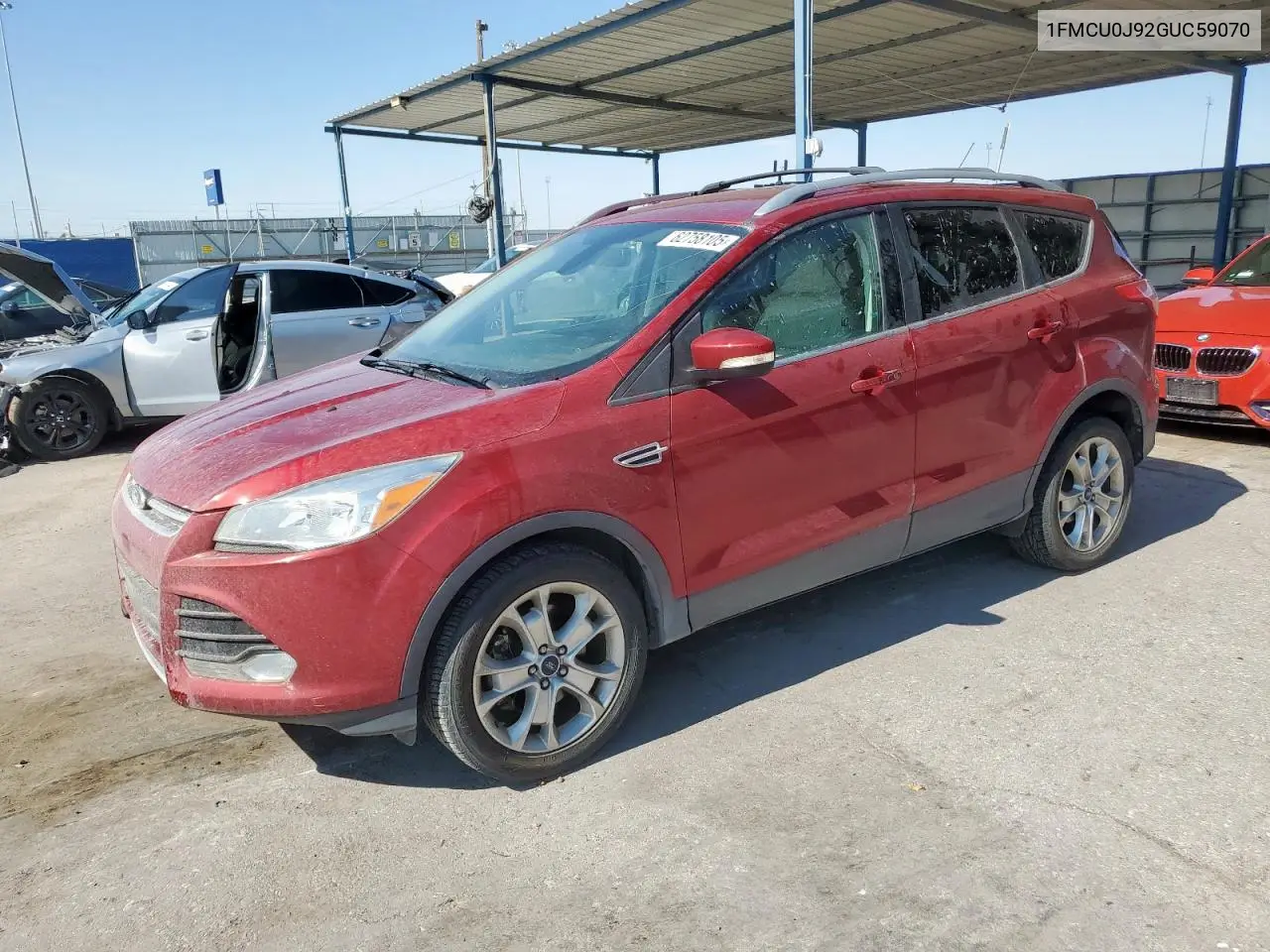 2016 Ford Escape Titanium VIN: 1FMCU0J92GUC59070 Lot: 62758105