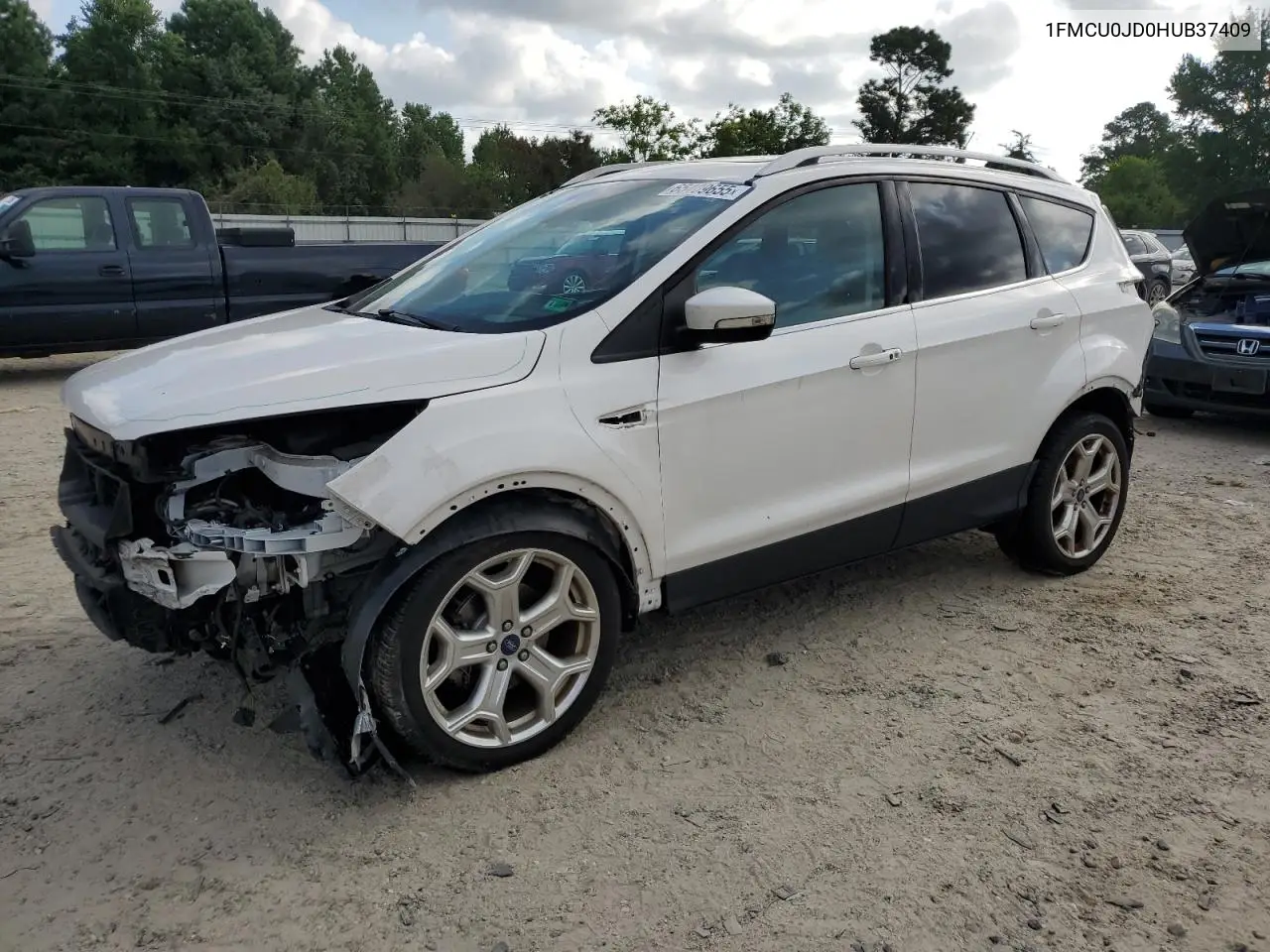 2017 Ford Escape Titanium VIN: 1FMCU0JD0HUB37409 Lot: 65409655