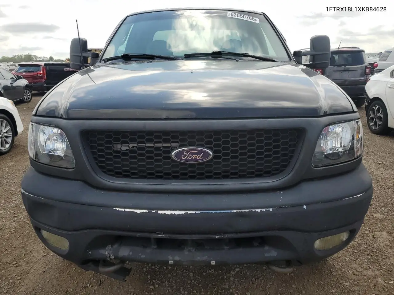 1999 Ford F150 VIN: 1FTRX18L1XKB84628 Lot: 63050765