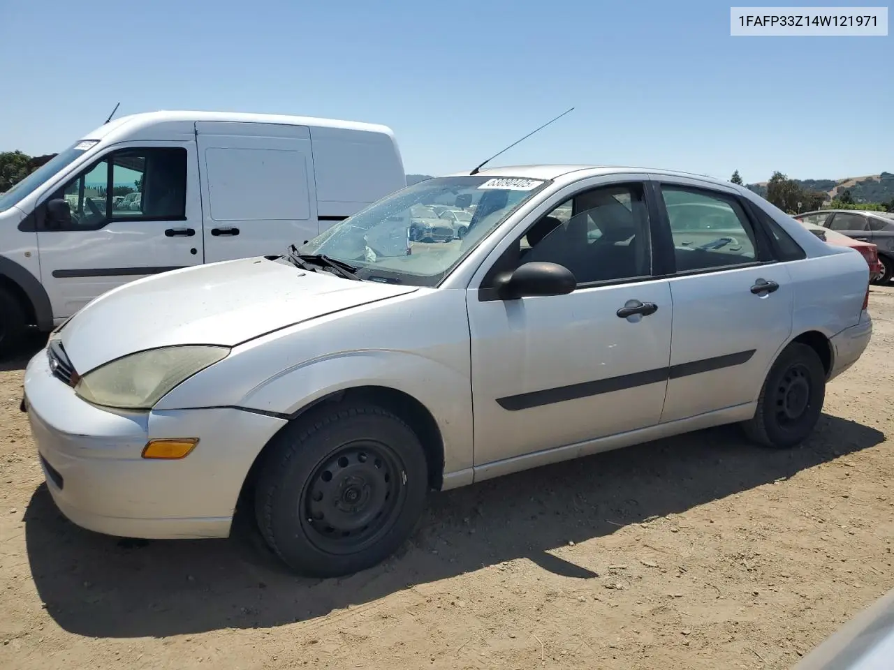 2004 Ford Focus Lx VIN: 1FAFP33Z14W121971 Lot: 63090405