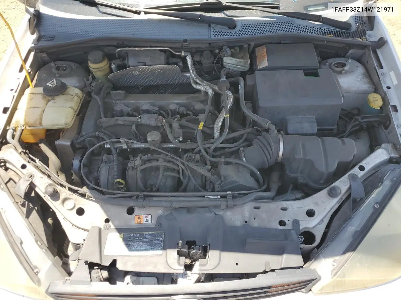 2004 Ford Focus Lx VIN: 1FAFP33Z14W121971 Lot: 63090405