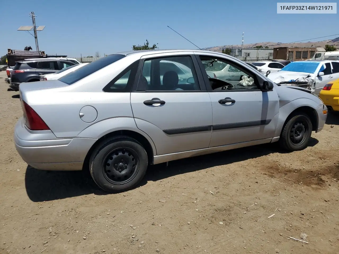 2004 Ford Focus Lx VIN: 1FAFP33Z14W121971 Lot: 63090405