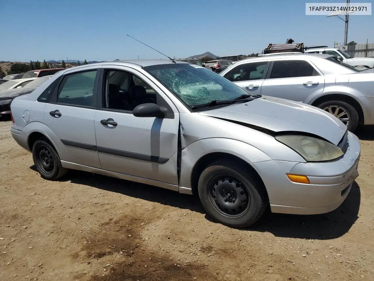 2004 Ford Focus Lx VIN: 1FAFP33Z14W121971 Lot: 63090405