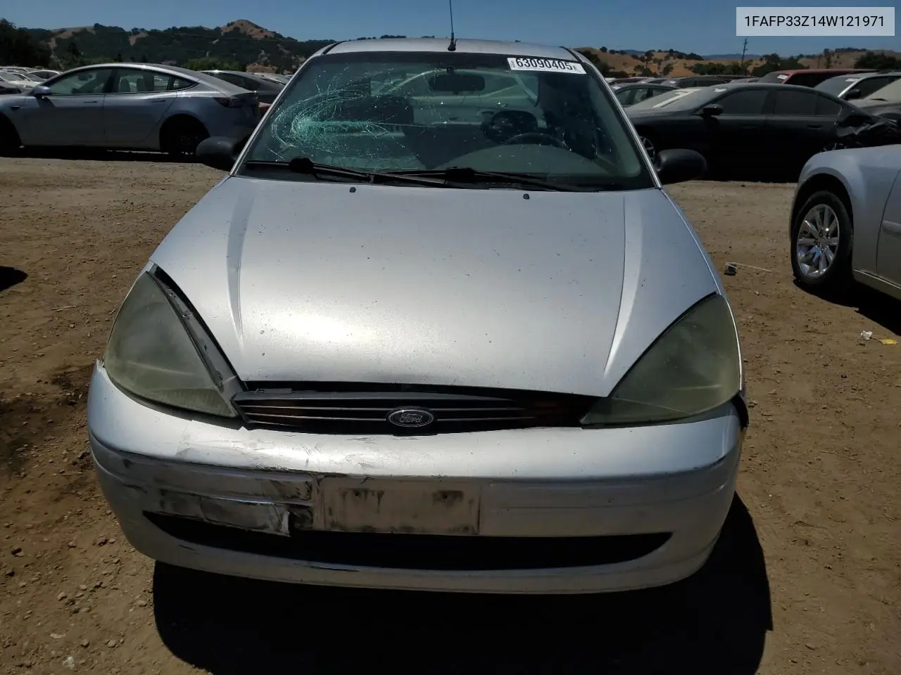 2004 Ford Focus Lx VIN: 1FAFP33Z14W121971 Lot: 63090405