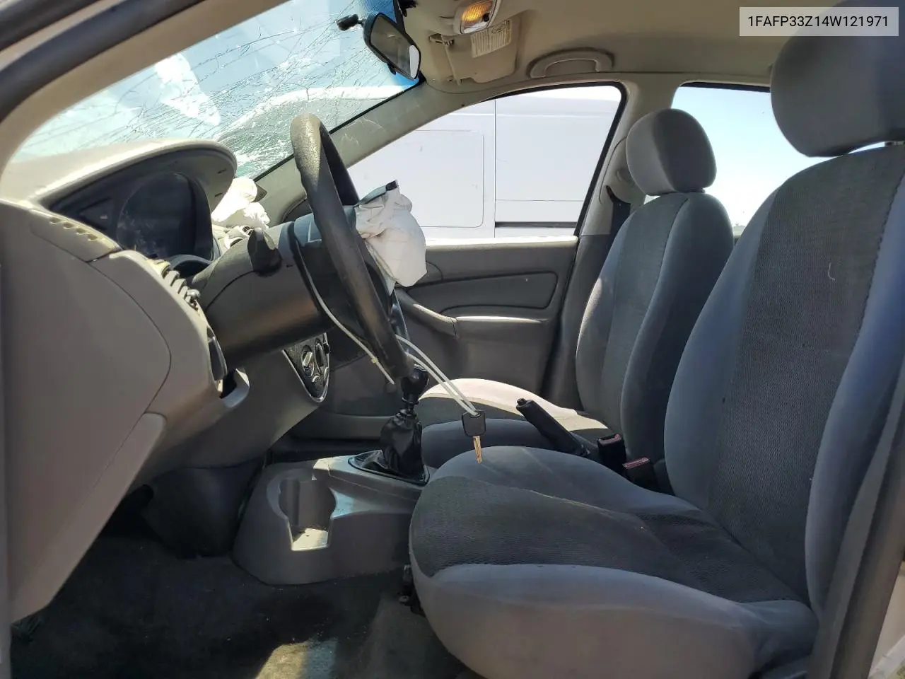 2004 Ford Focus Lx VIN: 1FAFP33Z14W121971 Lot: 63090405
