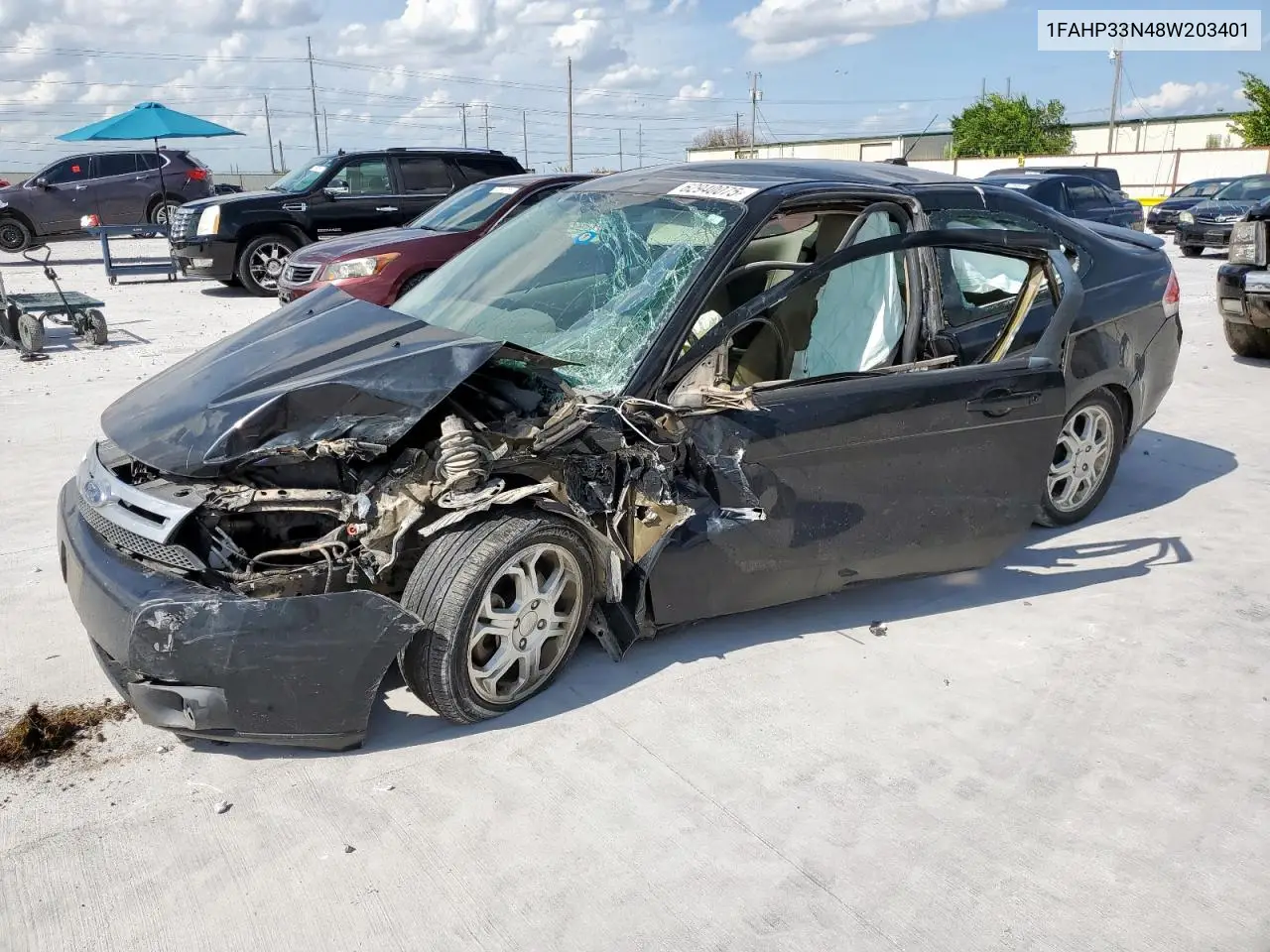 2008 Ford Focus Se VIN: 1FAHP33N48W203401 Lot: 62940075