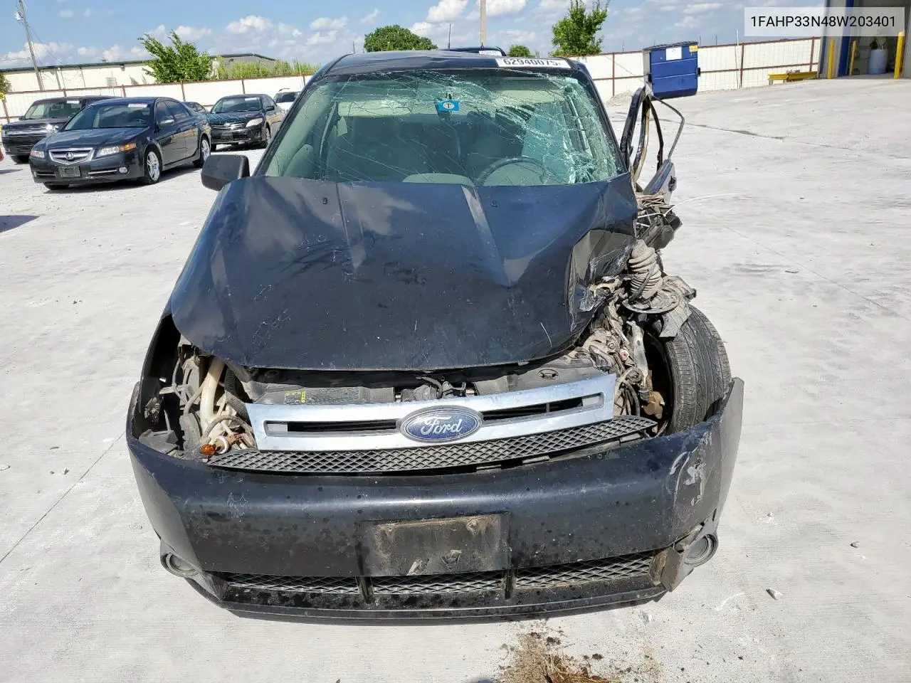 2008 Ford Focus Se VIN: 1FAHP33N48W203401 Lot: 62940075