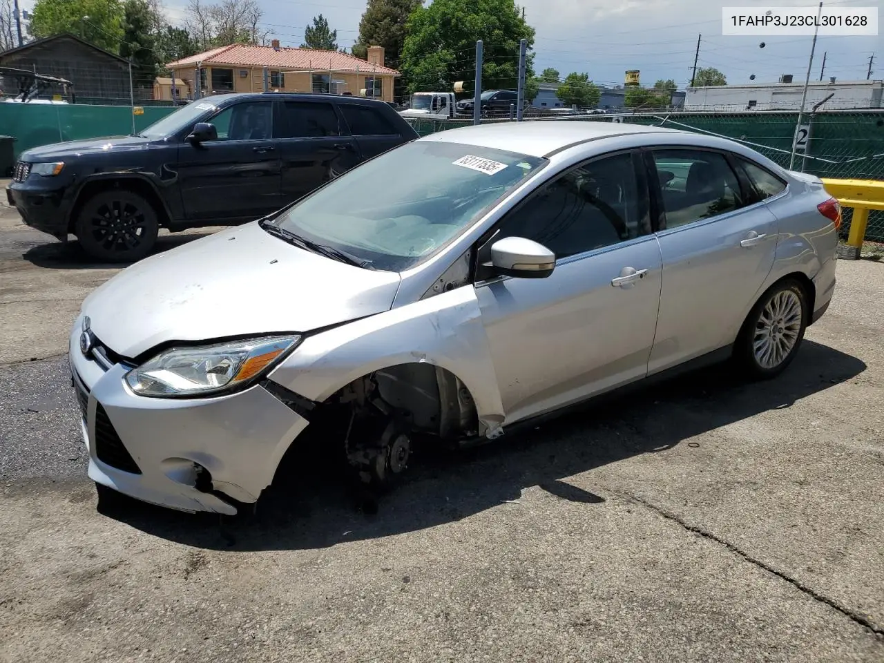2012 Ford Focus Titanium VIN: 1FAHP3J23CL301628 Lot: 63111535