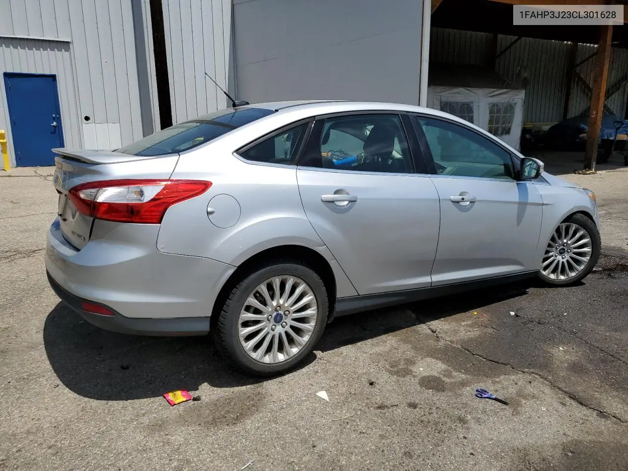 2012 Ford Focus Titanium VIN: 1FAHP3J23CL301628 Lot: 63111535