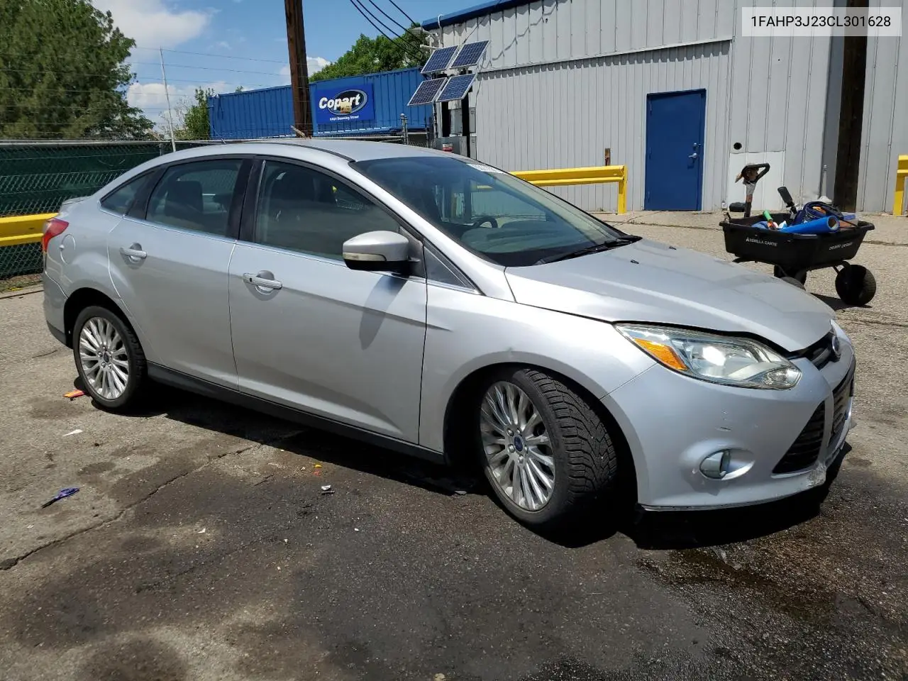 2012 Ford Focus Titanium VIN: 1FAHP3J23CL301628 Lot: 63111535