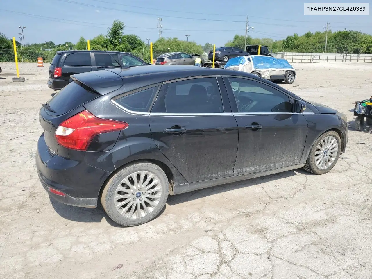 2012 Ford Focus Titanium VIN: 1FAHP3N27CL420339 Lot: 63304255