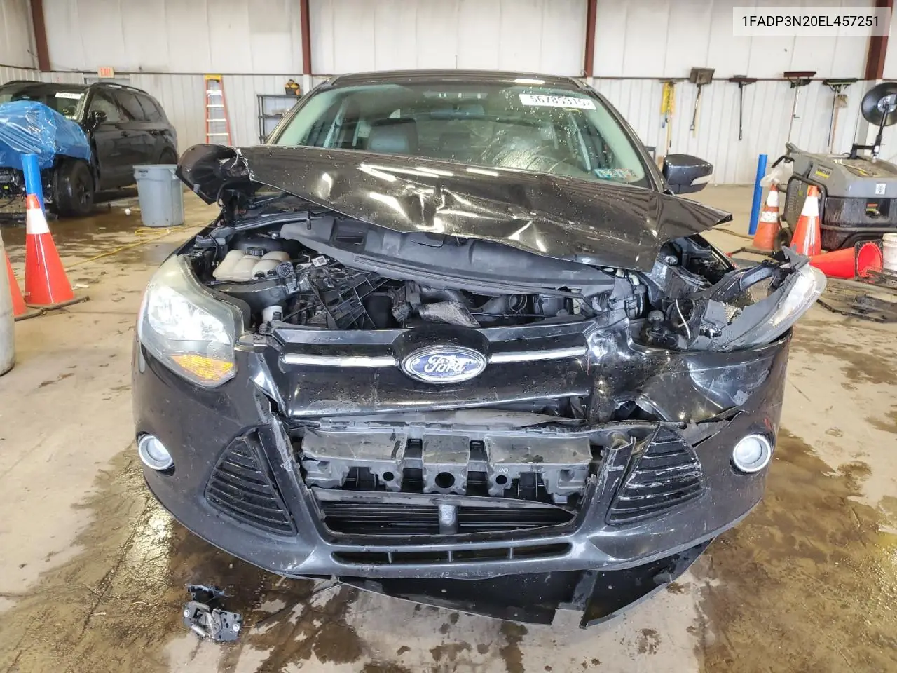 2014 Ford Focus Titanium VIN: 1FADP3N20EL457251 Lot: 56785315