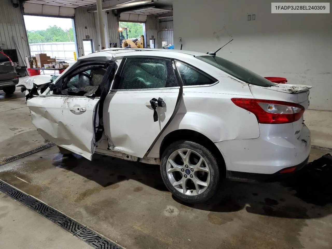 2014 Ford Focus Titanium VIN: 1FADP3J28EL240309 Lot: 56841415