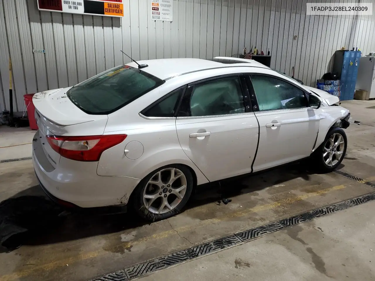 2014 Ford Focus Titanium VIN: 1FADP3J28EL240309 Lot: 56841415