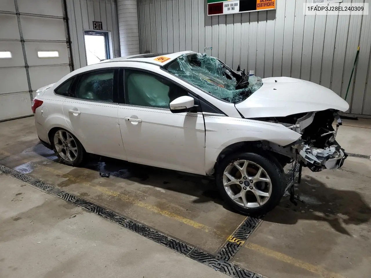 2014 Ford Focus Titanium VIN: 1FADP3J28EL240309 Lot: 56841415
