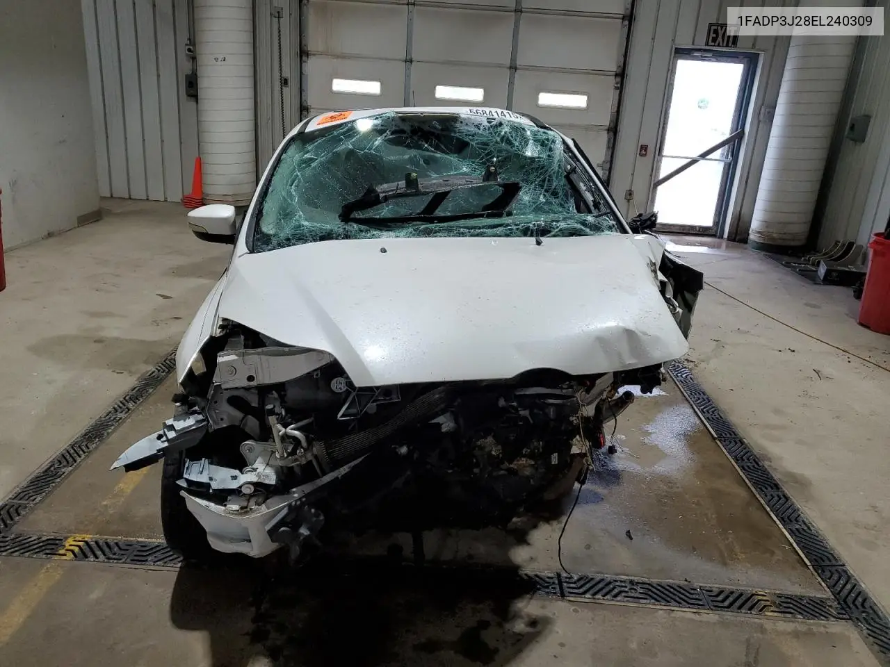 2014 Ford Focus Titanium VIN: 1FADP3J28EL240309 Lot: 56841415