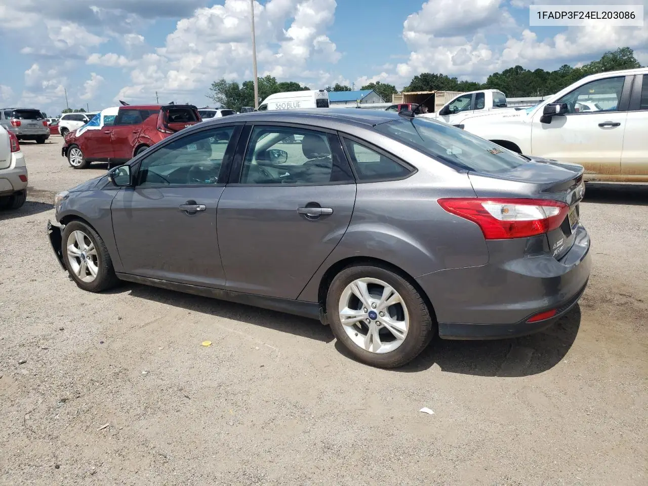 2014 Ford Focus Se VIN: 1FADP3F24EL203086 Lot: 62996615